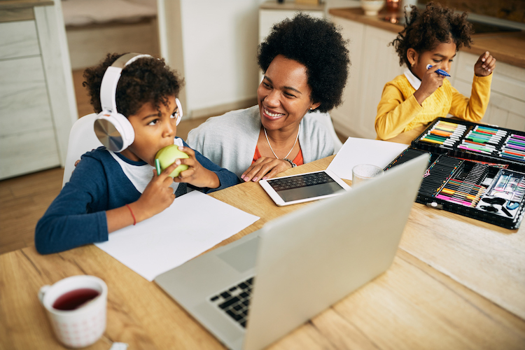 happy-black-single-mother-enjoying-with-her-children-during-homeschooling.jpg